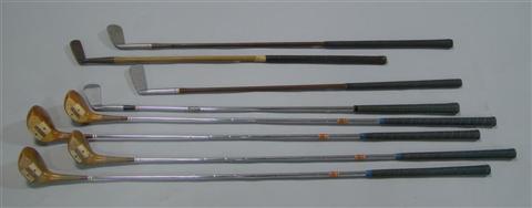 Appraisal: FOUR SPALDING MODEL GOLF CLUBS and together with four miscellaneous