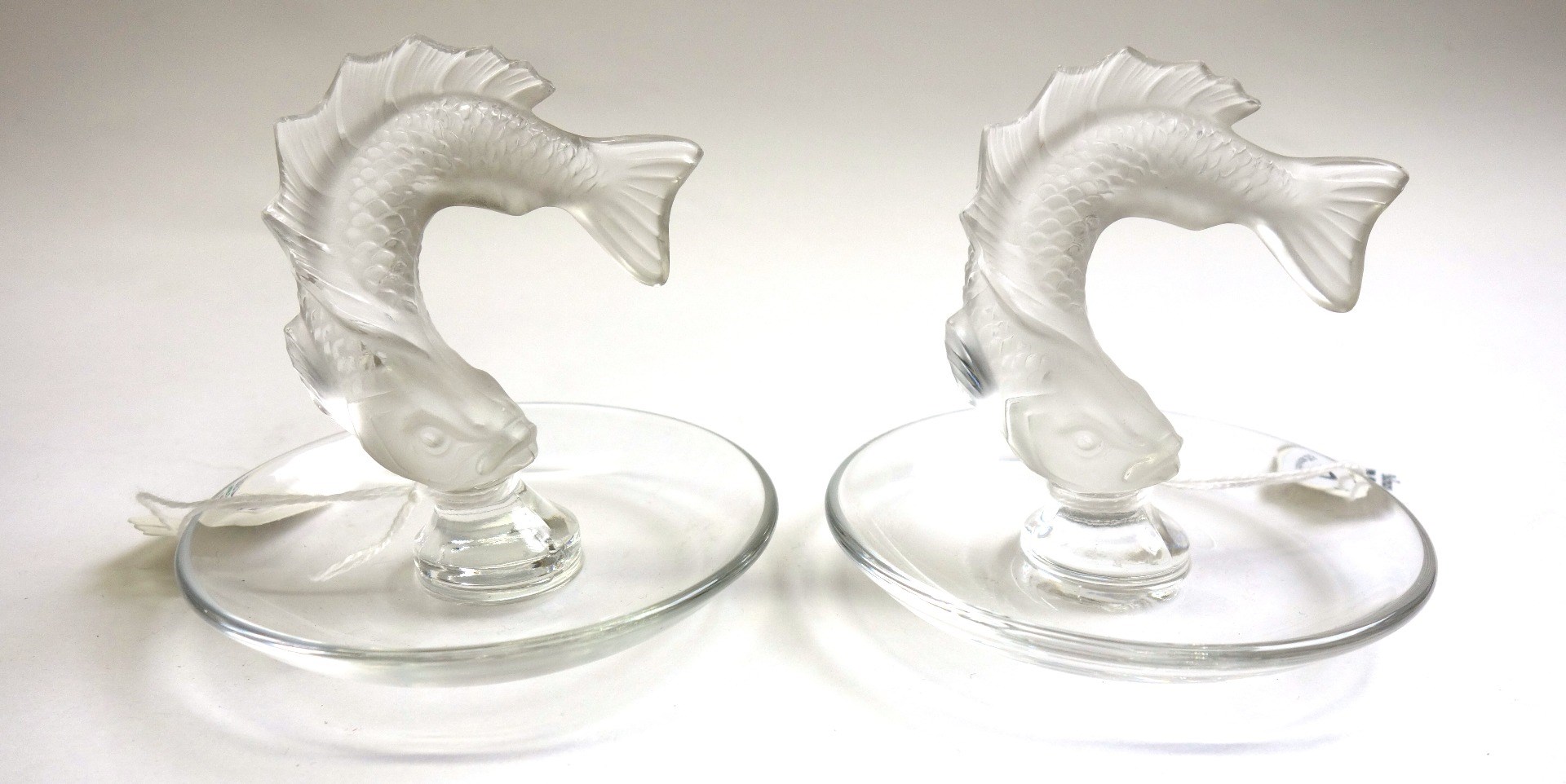 Appraisal: Two Lalique clear and frosted glass cendriers modern each circular