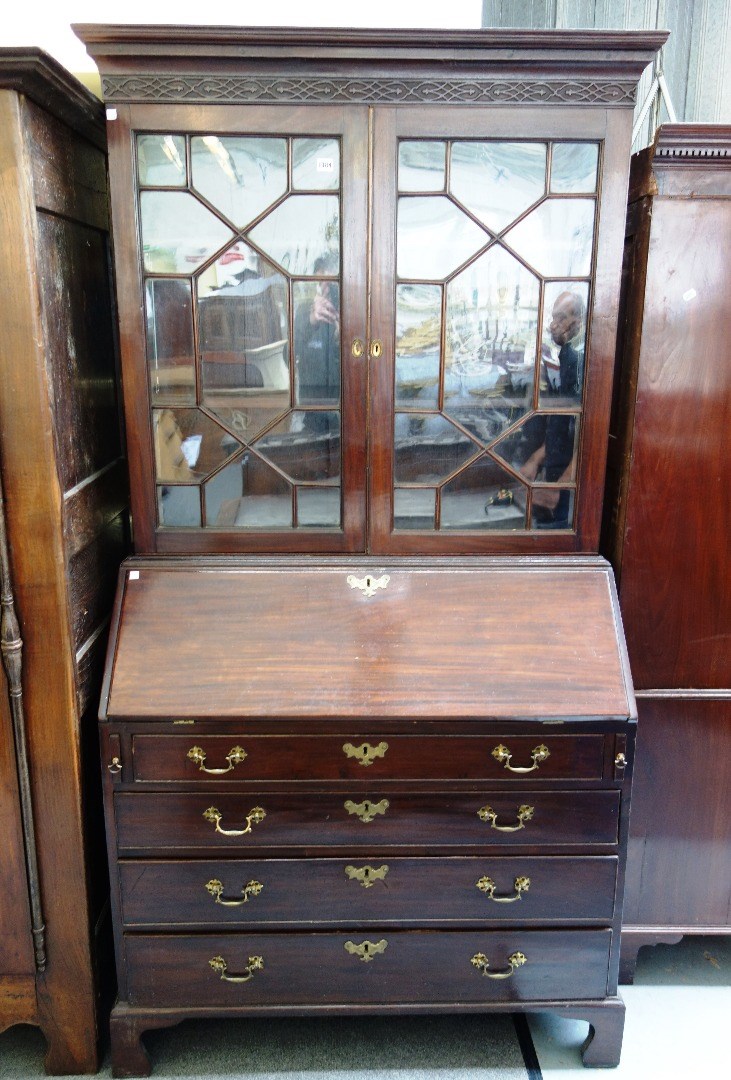 Appraisal: A George III mahogany bureau bookcase the pair of astragal