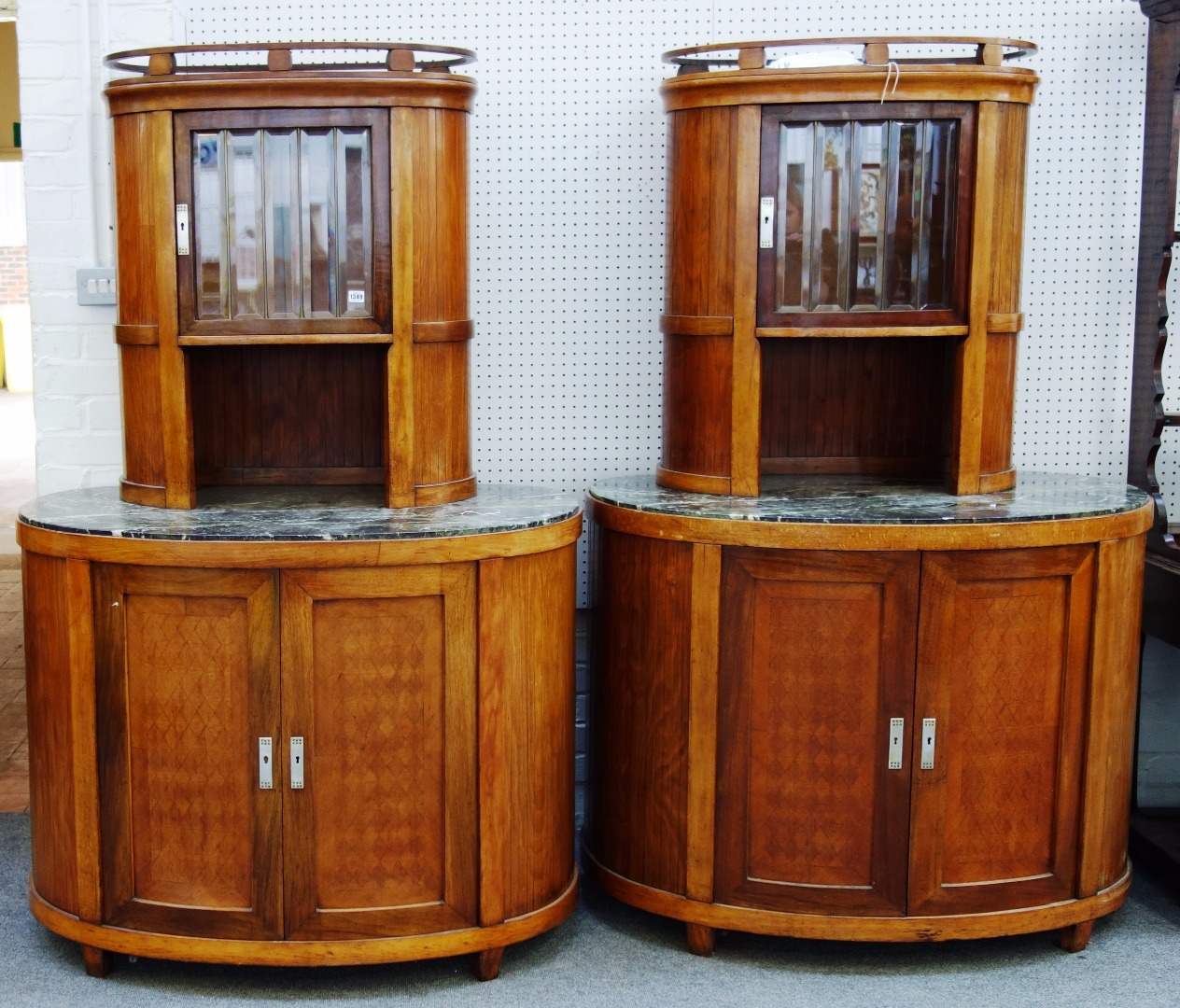 Appraisal: A pair of Josef Hoffman marble and beechwood cabinets with