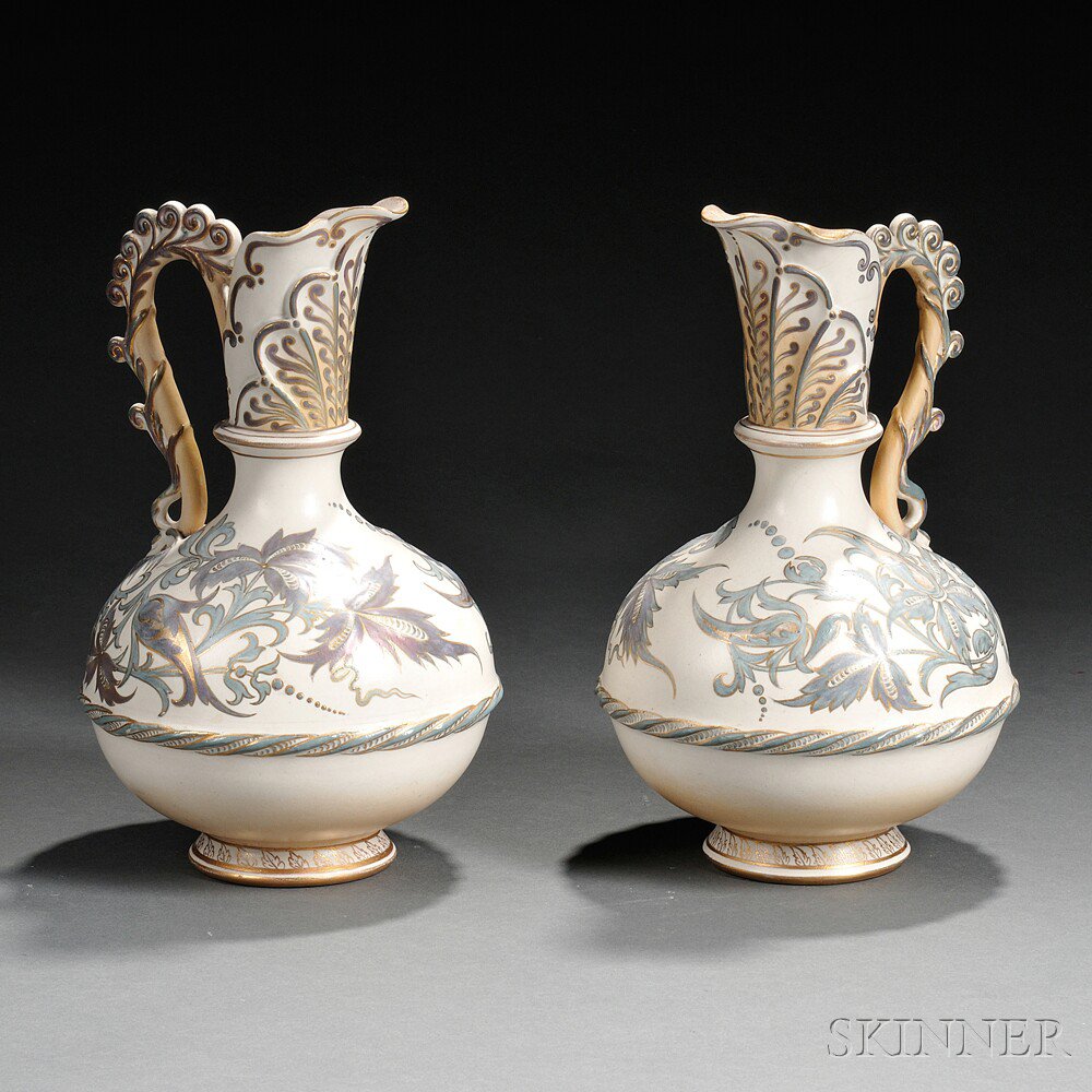 Appraisal: Pair of Doulton Lambeth Eliza Simmance Decorated Carrara Ewers England