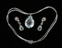 Appraisal: Ladies' Blue Topaz and White Gold Set The set includes