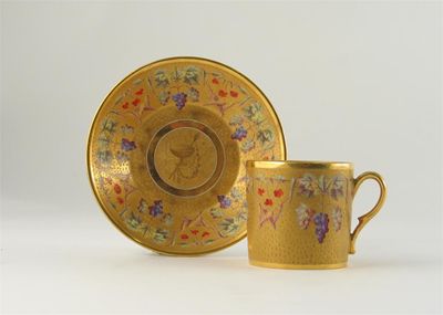 Appraisal: An unusual Continental coffee can and saucer painted with bands