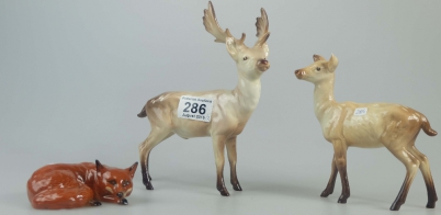 Appraisal: Beswick curled fox Stag and Doe A