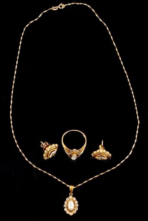 Appraisal: k yellow gold ring necklace earrings contain marquise cut and