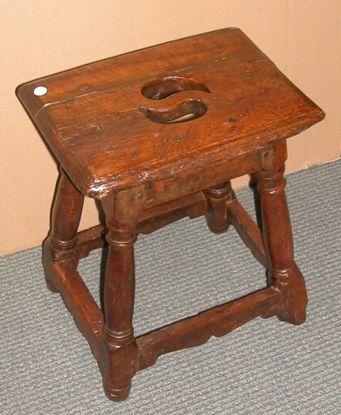 Appraisal: Continental Baroque Walnut Joint Stool rectangular top with central carrying