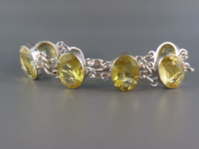 Appraisal: Lemon Citrine Sterling Silver Bracelet vivid oval gems totaling over