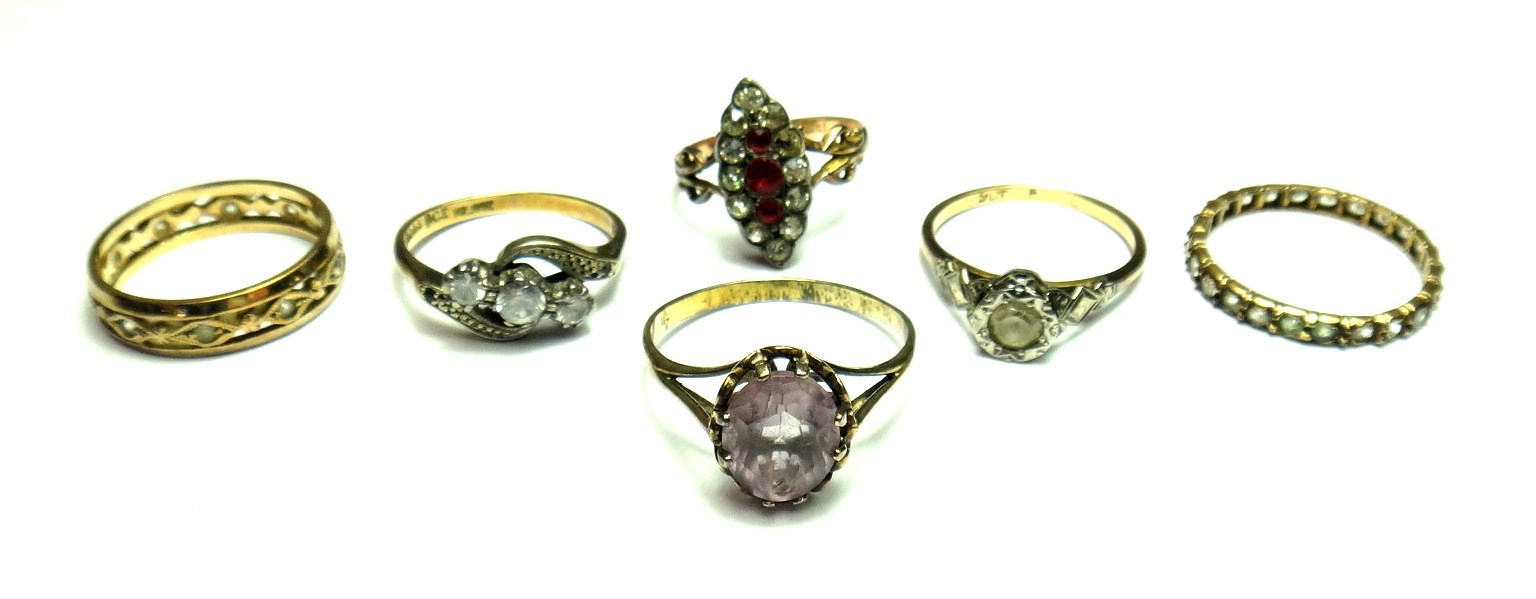 Appraisal: A gold red and colourless gem set marquise shaped cluster