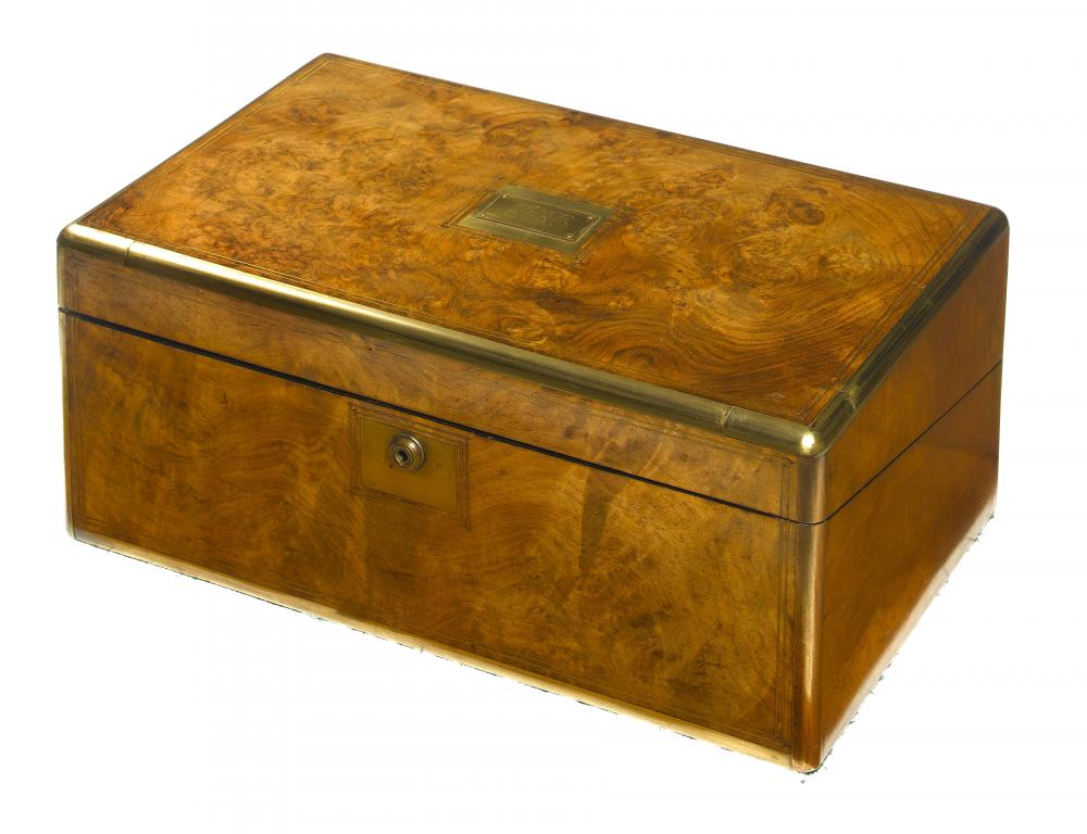 Appraisal: A VICTORIAN WALNUT WRITING BOX with brass stringing fitted interior