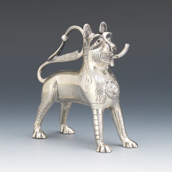 Appraisal: HANAU STERLING HAND LAMP x Sterling silver mythical beast shaped