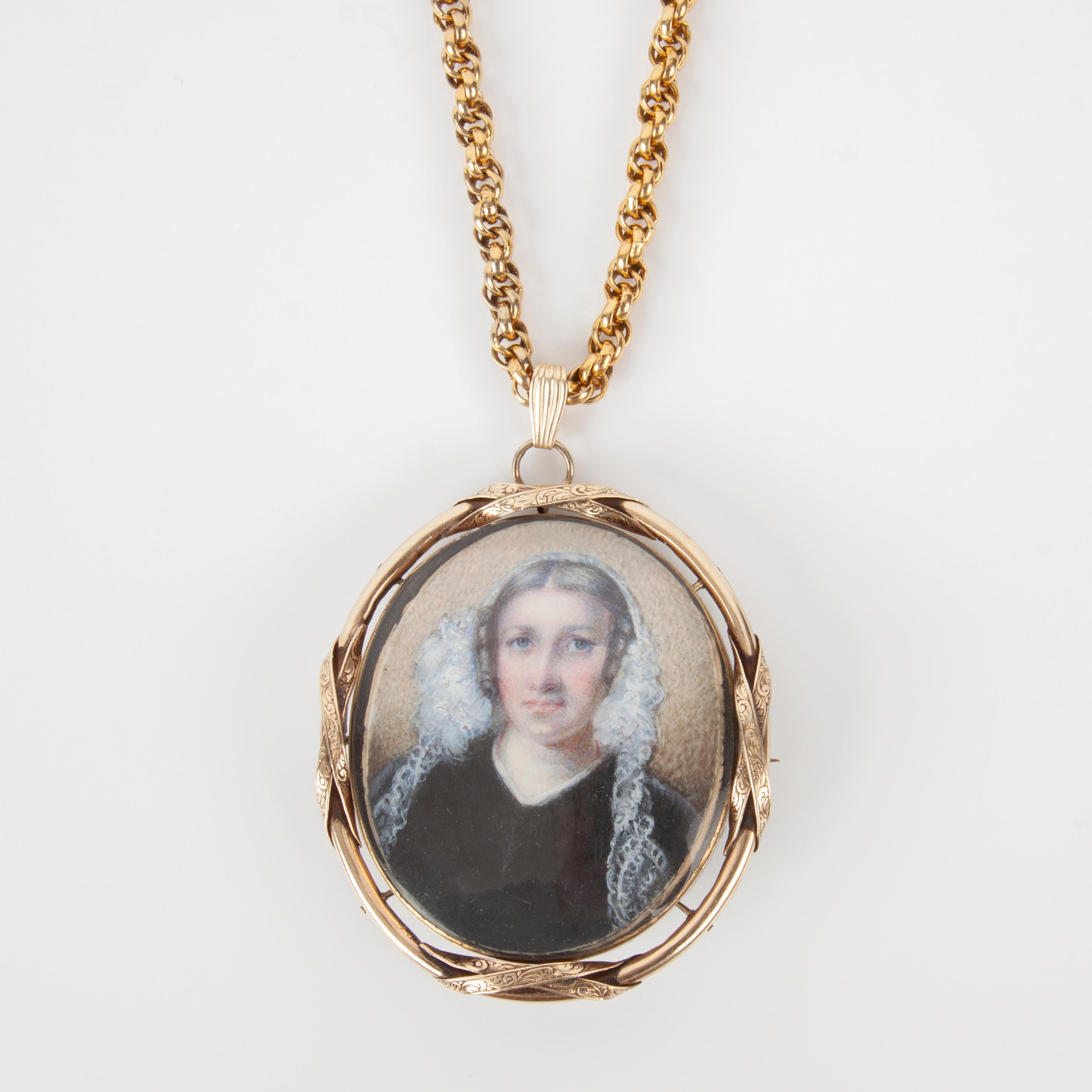 Appraisal: PORTRAIT MINIATURE WITH HAIR IN K GOLD FRAME TH C