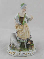 Appraisal: A th century ceramic group of a shepherdess with lamb