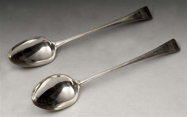 Appraisal: TWO GEORGE III SILVER BASTING SPOONS Old English and reed