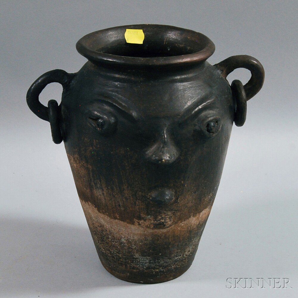 Appraisal: Redware Pottery Face Jug early th century repair ht wd