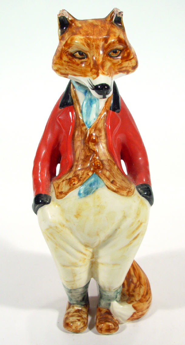 Appraisal: Rye pottery hunting fox in breeches and red jacket painted