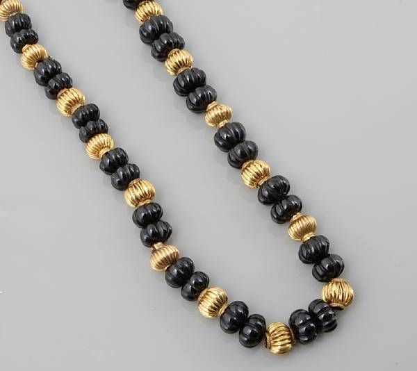 Appraisal: Natural History and Gemstones Comprising carved and fluted beads of