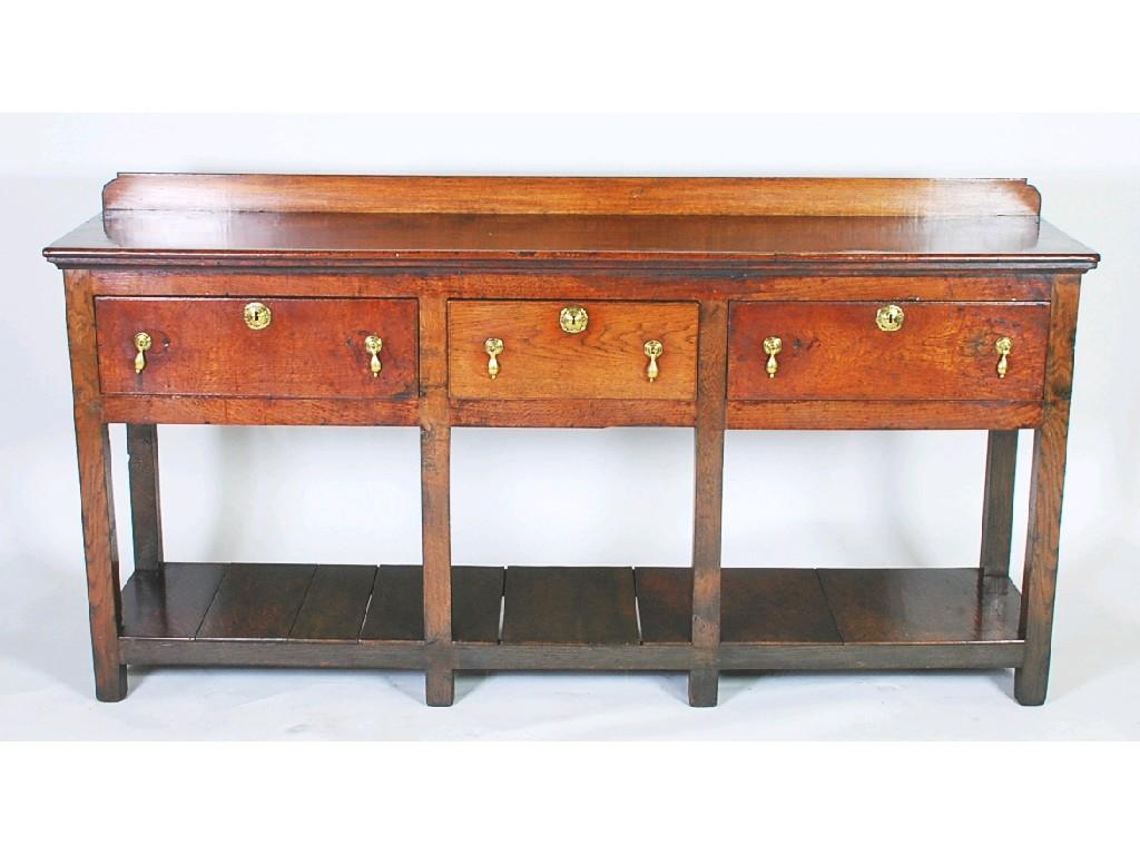 Appraisal: LATE EIGHTEENTH CENTURY OAK DRESSER BASE the rectangular plank top