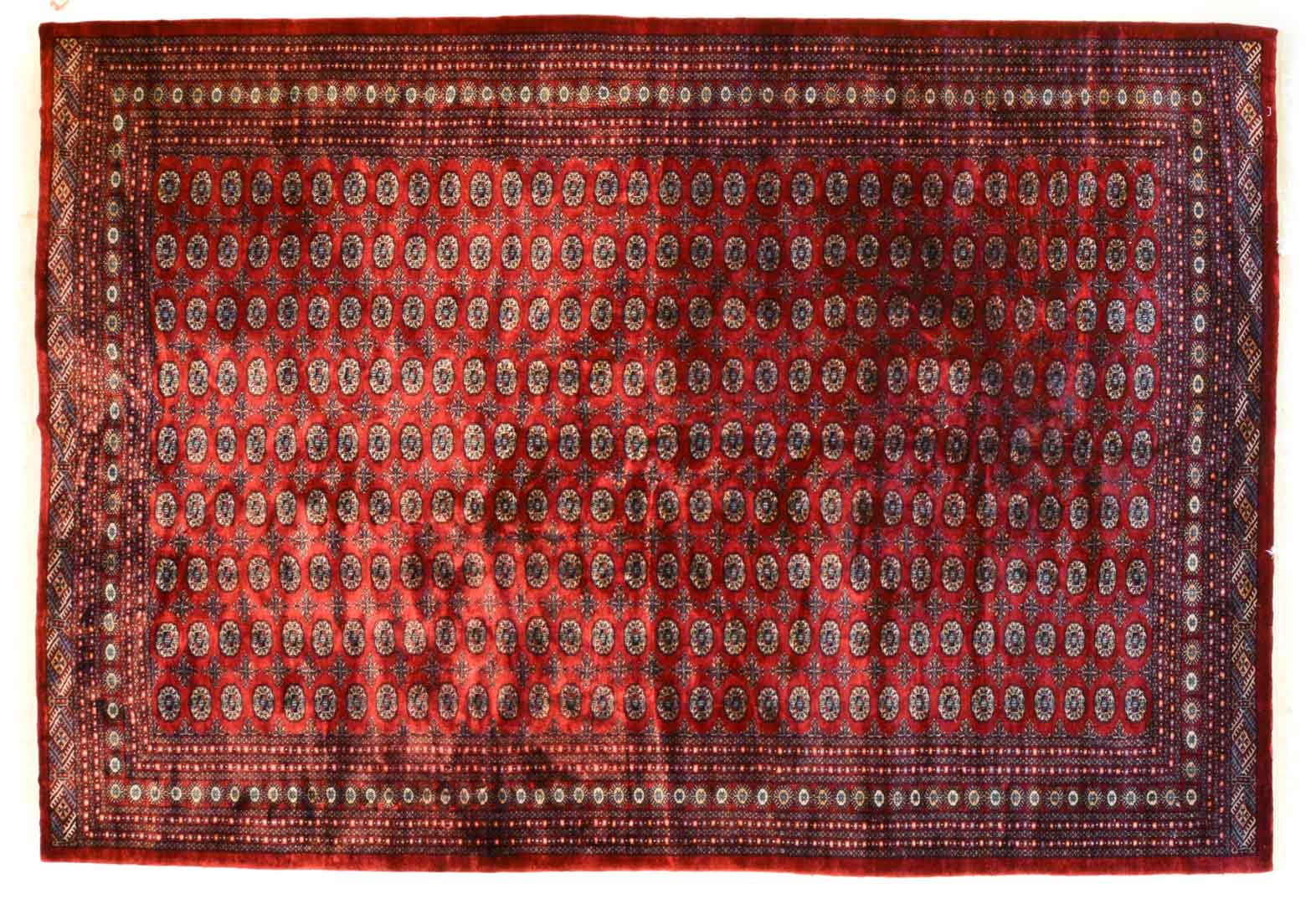 Appraisal: Pakistani Bohkara carpet approx x Pakistan circa Condition Animal clawed