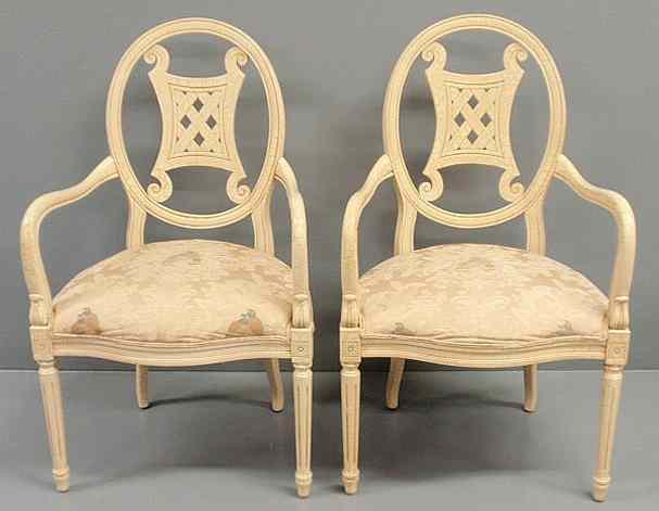 Appraisal: Pair of French style antiqued white open armchairs with ivory