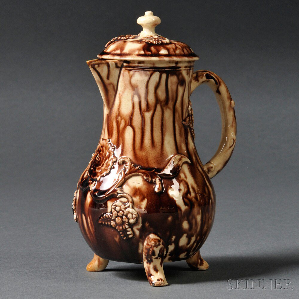 Appraisal: Staffordshire Cream-colored Earthenware Creamer and Cover England c pear shape