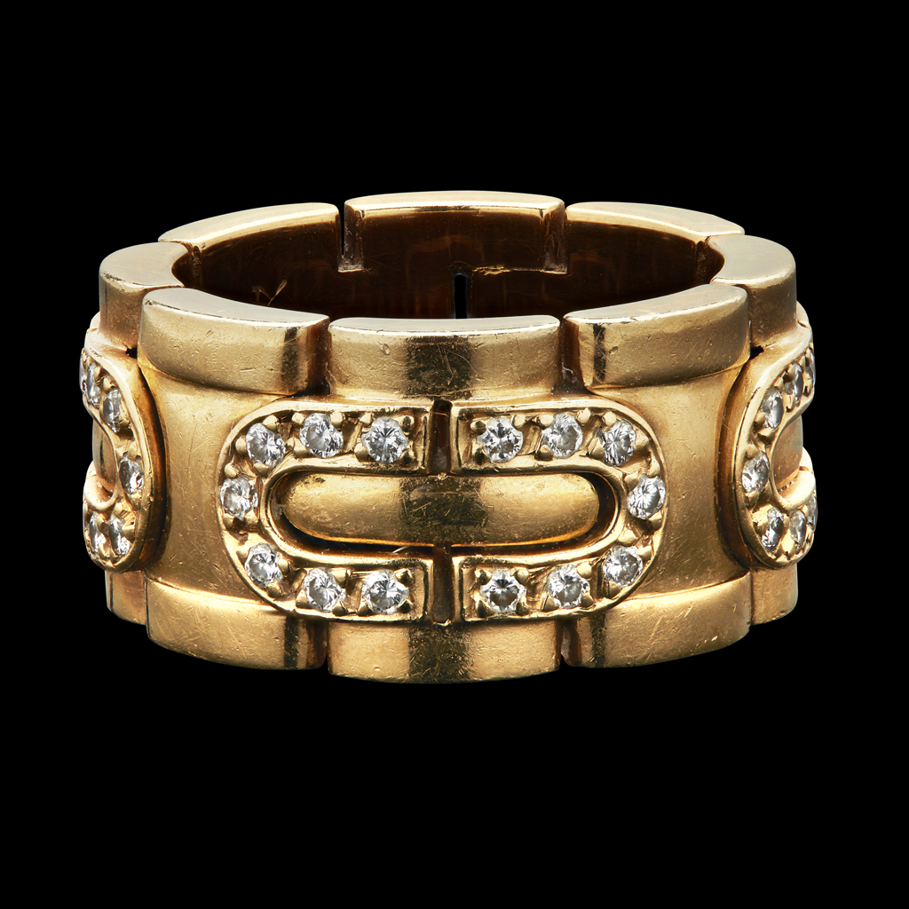 Appraisal: CARTIER - A diamond set ringcomposed of curved stylised links