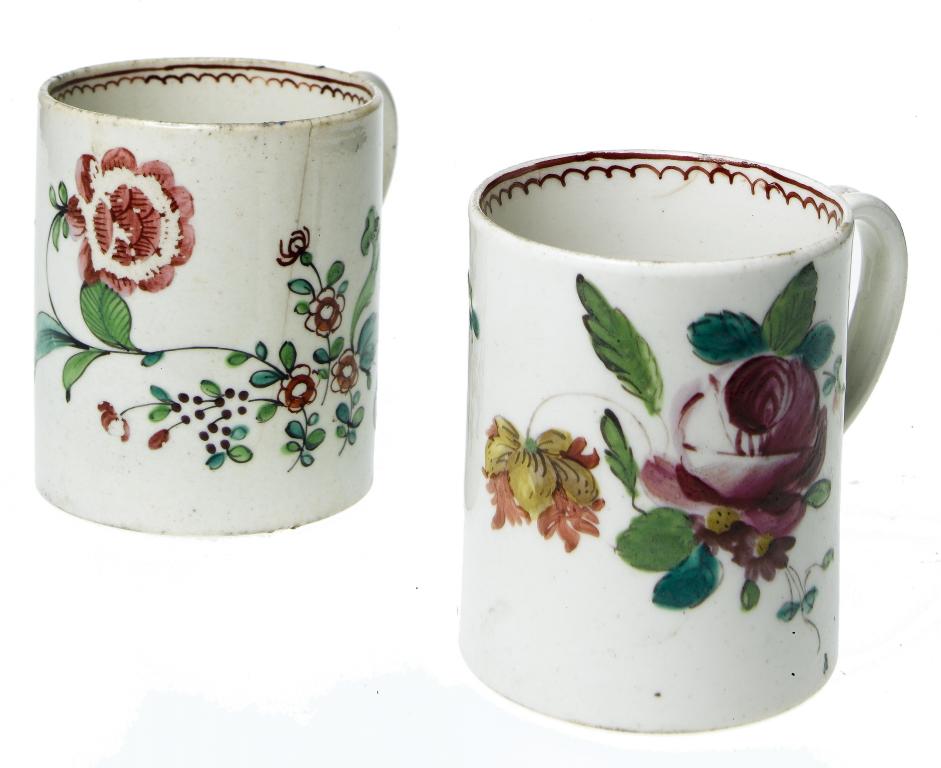 Appraisal: TWO LIVERPOOL POLYCHROME SMALL MUGS OR COFFEE CANS painted with