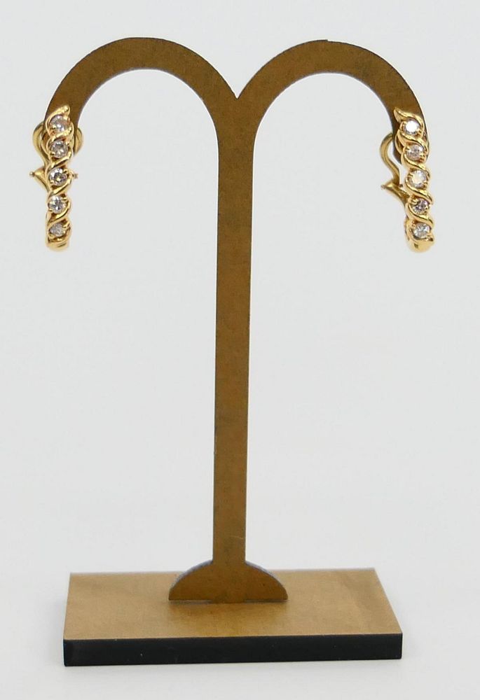 Appraisal: PAIR OF ALA K YELLOW GOLD DIAMOND EARRINGS A pair