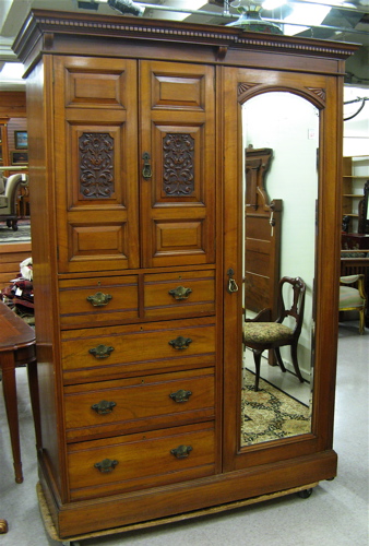 Appraisal: VICTORIAN WALNUT GENTLEMAN'S WARDROBE English c with dentil cornice over