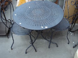 Appraisal: A metal circular garden table together with two chairs