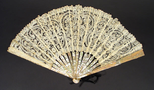 Appraisal: Lace fan with mother of pearl guard sticks in a