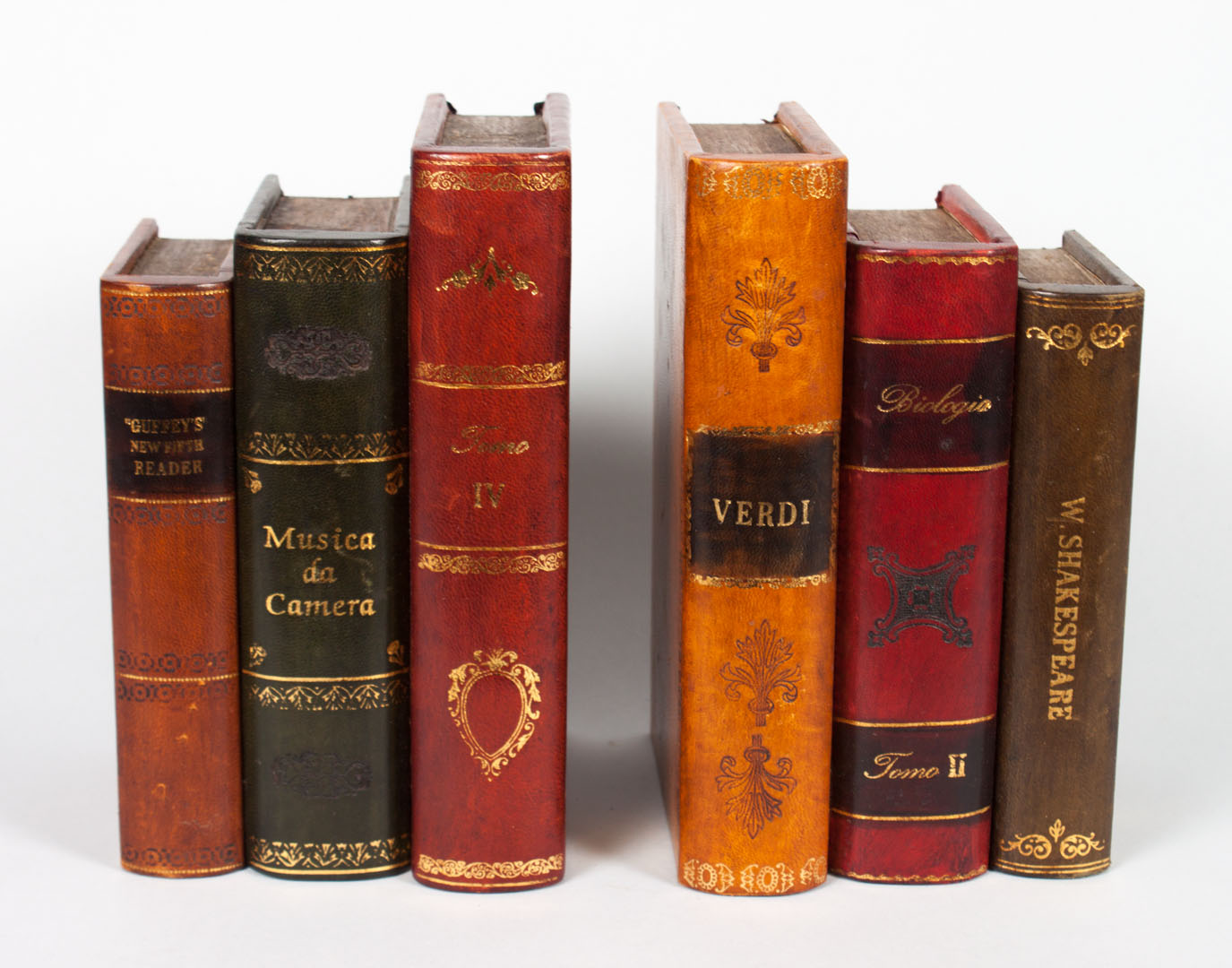 Appraisal: Two sets of leather and wood decorative books each group