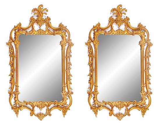 Appraisal: A Pair of Louis XV Style Gilt Mirrors Height x