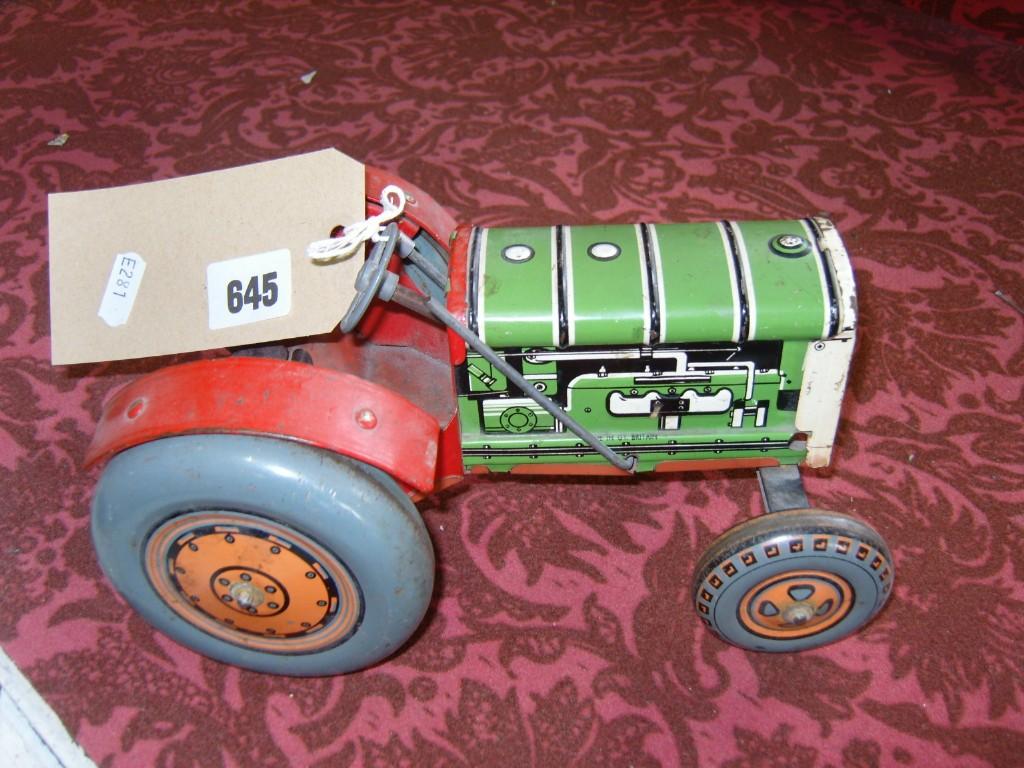 Appraisal: A British made tin plate model tractor with green and