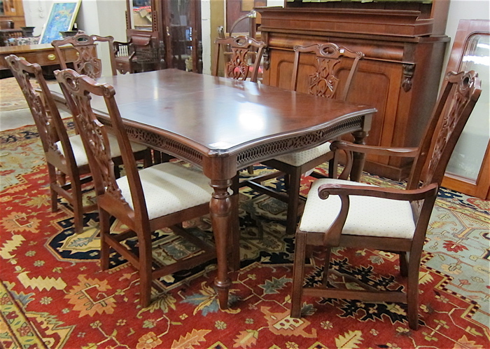 Appraisal: CHIPPENDALE STYLE MAHOGANY DINING TABLE AND CHAIR SET recent production