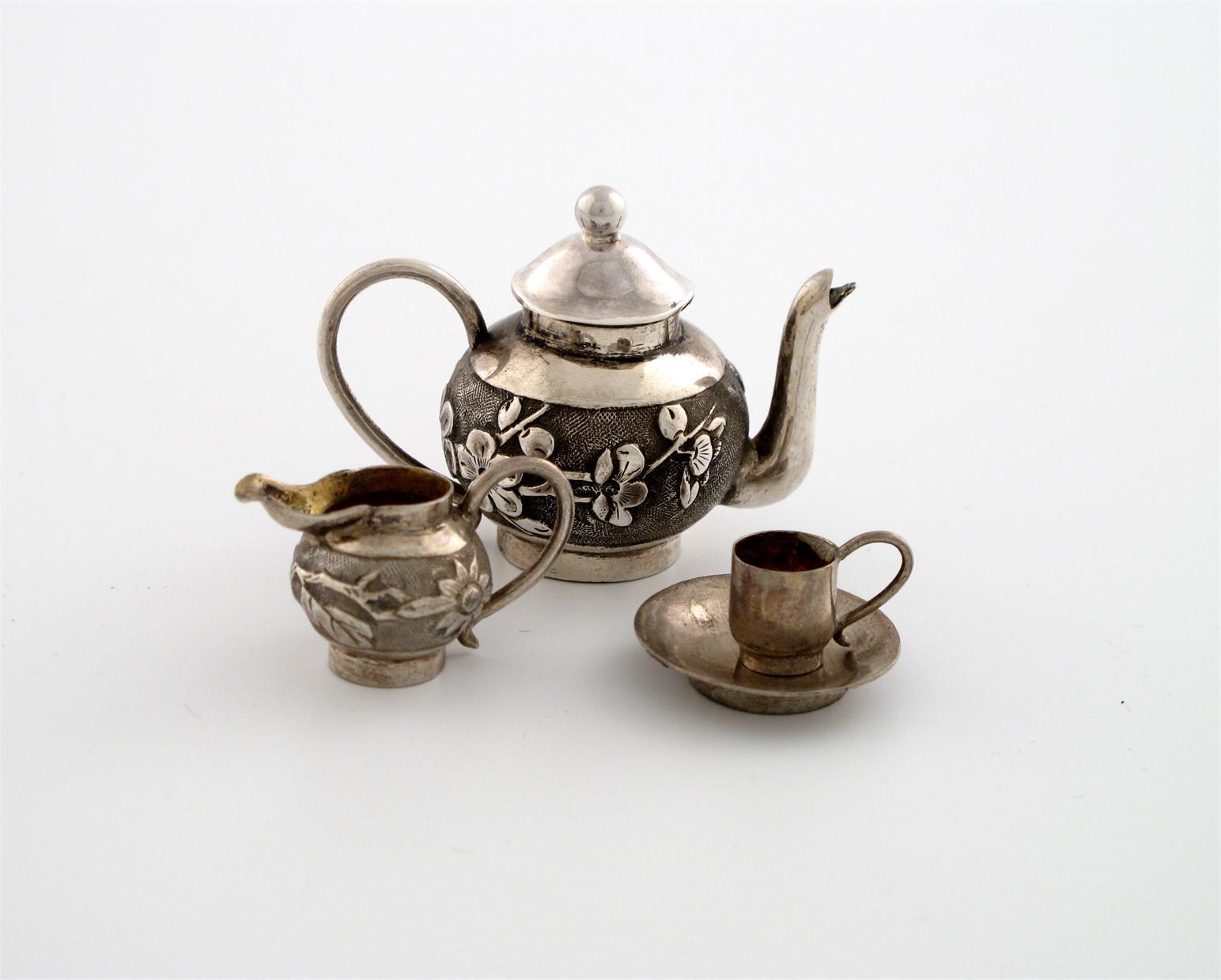 Appraisal: A miniature silver teapot