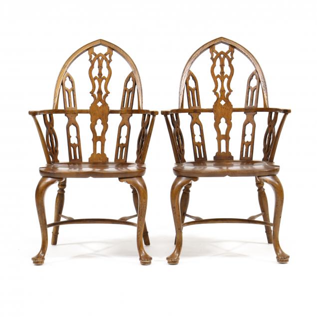 Appraisal: BAKER PAIR OF GOTHIC STYLE OAK WINDSOR ARMCHAIRS Late th