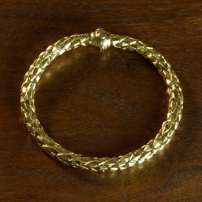 Appraisal: ITALIAN EIGHTEEN KARAT GOLD CHIMENTO BRACELET The flexible yellow gold