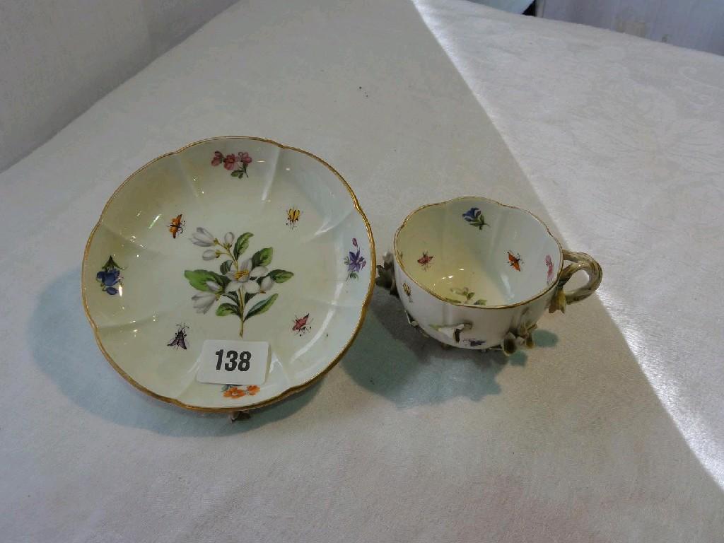 Appraisal: A th century Meissen cabinet cup and saucer with painted