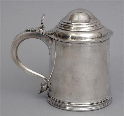 Appraisal: AMERICAN ARMORIAL ENGRAVED SILVER TANKARD The lid impressed the flared