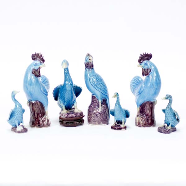 Appraisal: Seven Chinese porcelain figurines peacock blue glaze roosters chickens and