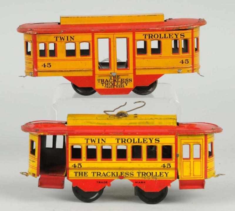 Appraisal: Strauss Wind-Up Trolley Set Description Both marked number One is