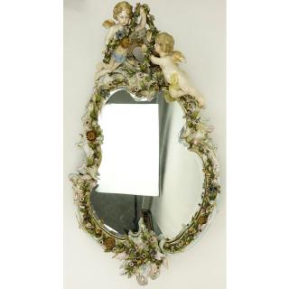 Appraisal: Antique Dresden Style Figural Porcelain Mirror Decorated with putti and