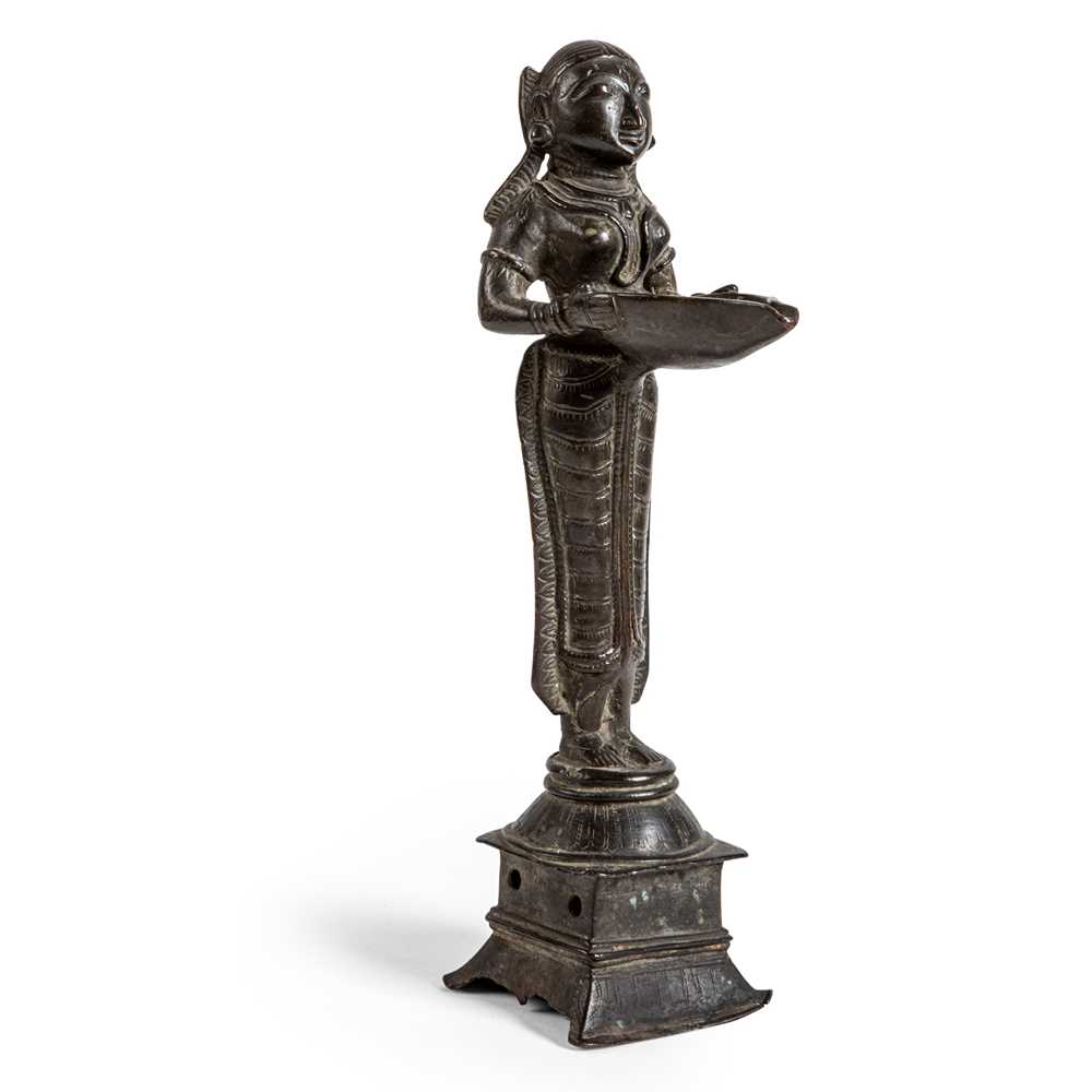 Appraisal: BRONZE OIL LAMP IN THE FORM OF LAKSHMI THE HINDU