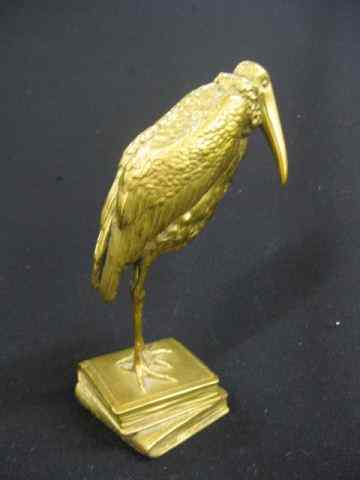 Appraisal: J Kucharzyk Bronze of a Stork standing on books ''