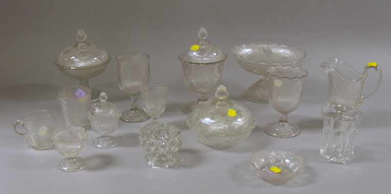 Appraisal: Approximately Thirty-seven Pieces of Colorless Ribbed Ivy Pattern Glass Tableware