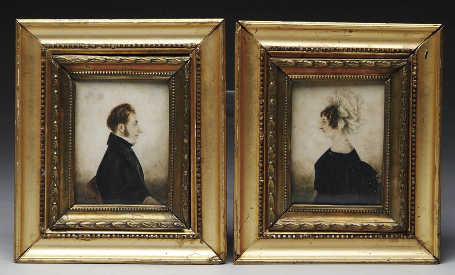 Appraisal: PAIR OF MINIATURE PORTRAITS OF A MAN AND A WOMAN