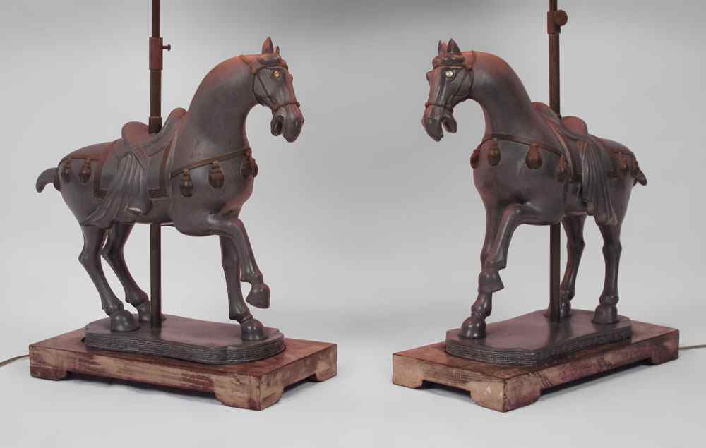 Appraisal: PAIR OF PEWTER TANG HORSE STYLE LAMPS Pewter horses mounted