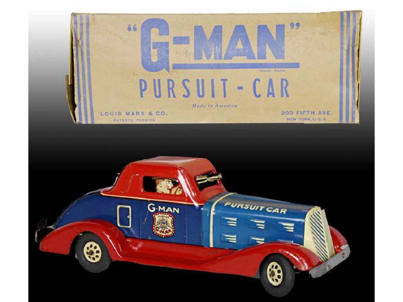 Appraisal: Marx Tin Wind-Up G-Man Toy Pursuit Car with Origin Description