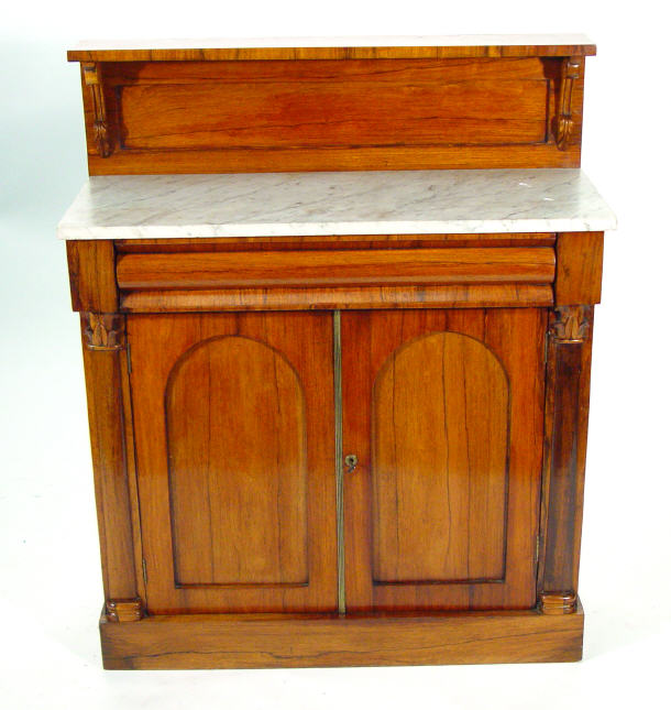 Appraisal: th Century rosewood chiffonier with white marble top above a