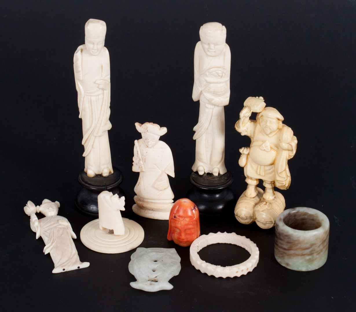 Appraisal: Oriental carved ivory bone and hardstone objects assorted objects including